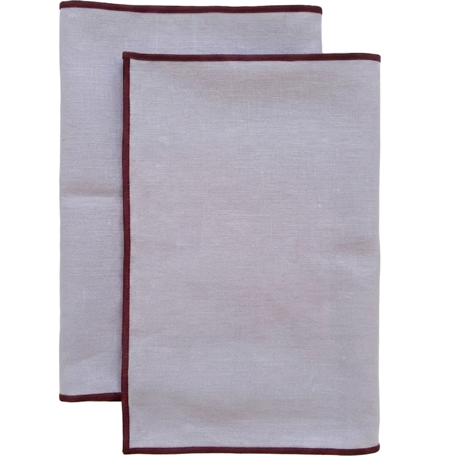 servilletas de lino lilas con ribete granate