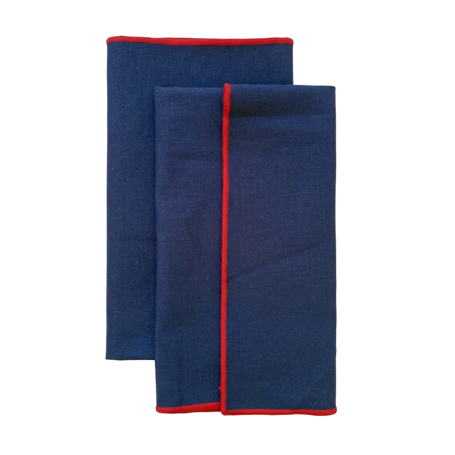 pack dos servilletas de mezcla de lino azules marinas con ribete rojo 